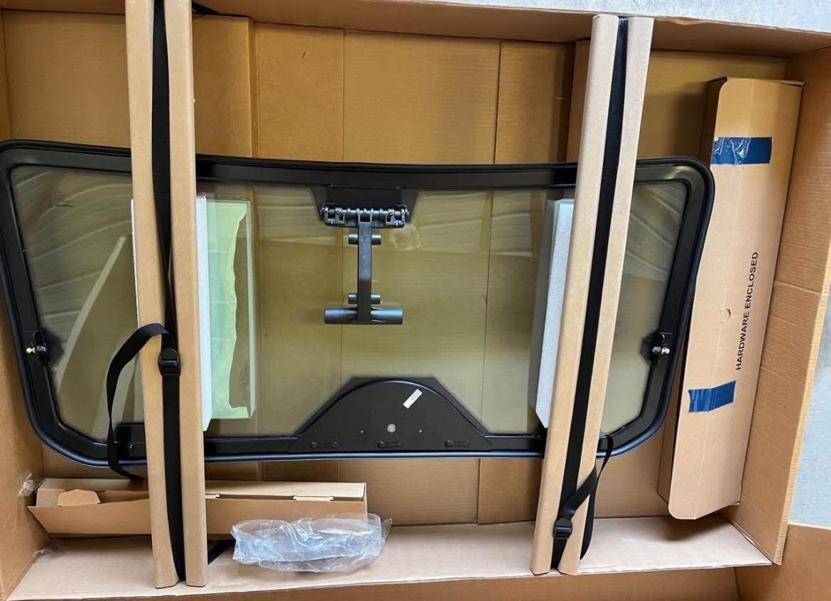 Polaris Front windshield Tip Out General